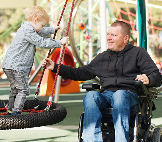 Disabled Father play with his little son and daughter